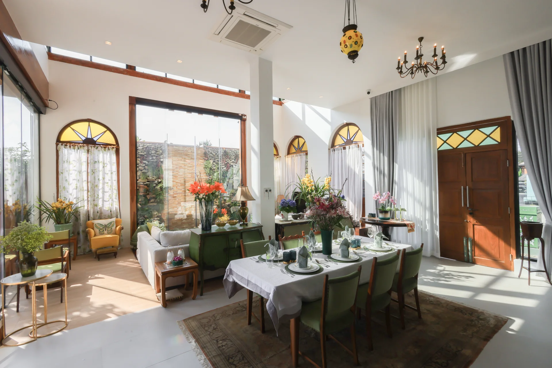 Huge open plan living area with views of the garden, pool and river