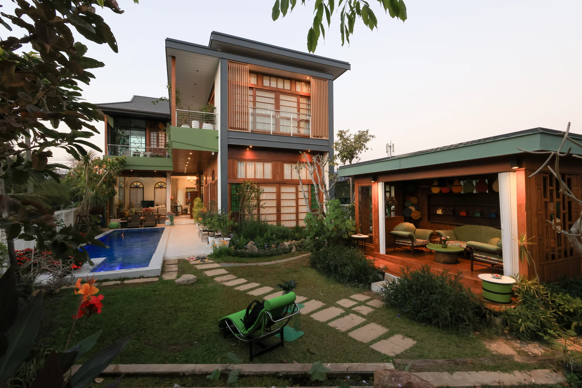 Chez Jean Villa's private infinity pool and shaded family entertainment area.